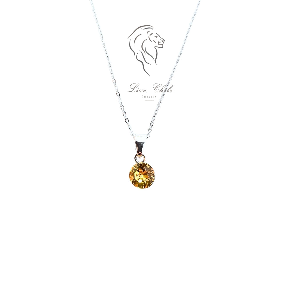 Collar punto de luz con cristal austriaco color amarillo citrino y cadena fina de plata, joyeria minimalista en Chile.